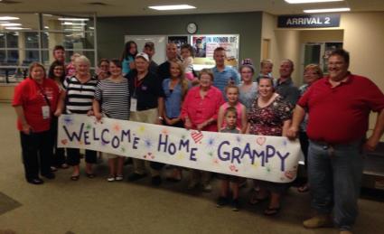 Welcoming home Roland from the Iowa Veterans Honor Flight to Washington, D.C.